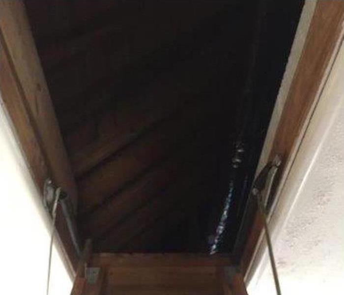 Stairway leading up to attic.